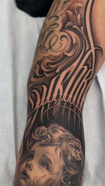 Realism child portrait tattoo by @angelstat2