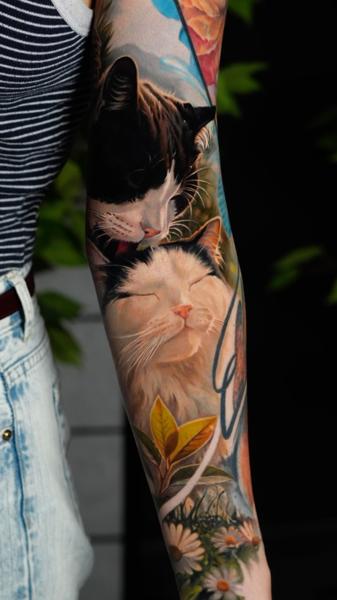 Realism cats tattoo by @animal_tattooer