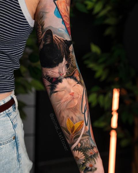 Realism cat portrait tattoo by @animal_tattooer
