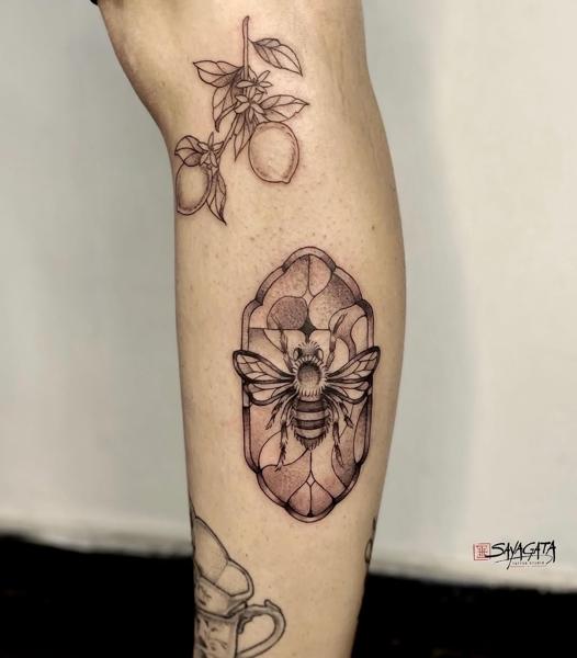 Fine line illustrative framed bee tattoo by @_annuk_