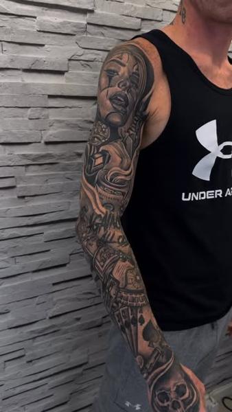 Blackwork abstract sleeve tattoo by @anna_tattooss