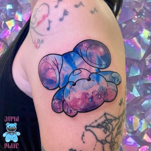 Illustrative galaxy plushie tattoo by @__annablue