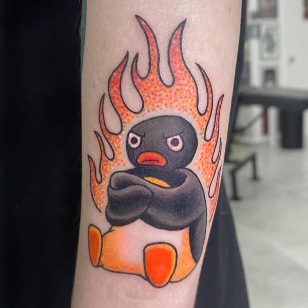 New school angry pingu flames tattoo by @__annablue
