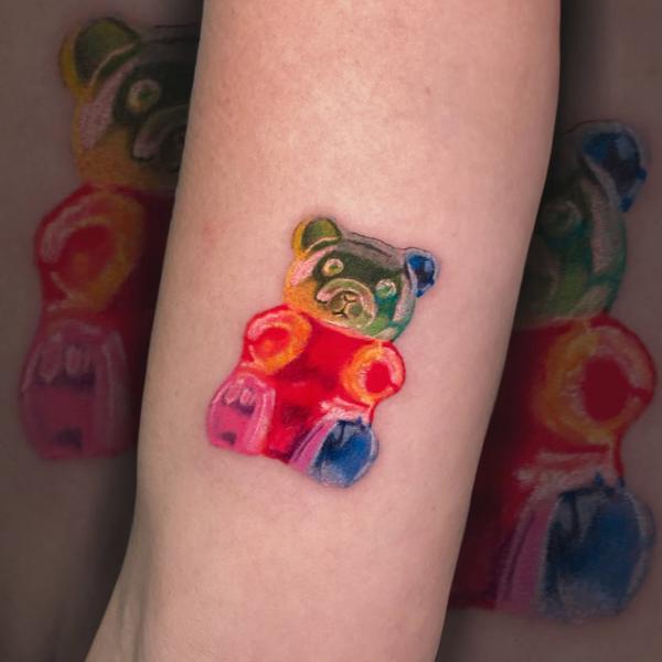 Illustrative rainbow gummy bear tattoo by @__annablue