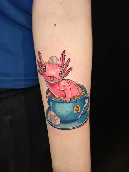 Illustrative axolotl in teacup tattoo by @meerkatstattoo