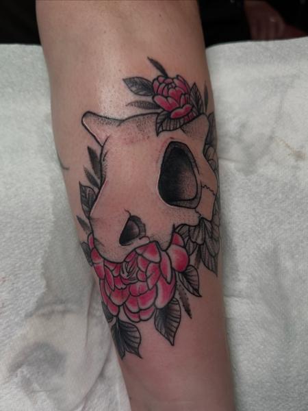 Neo-traditional cubone skull flowers tattoo by @antclaytattoo