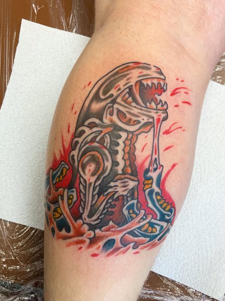Traditional alien xenomorph tattoo by @eagles_of_swindon