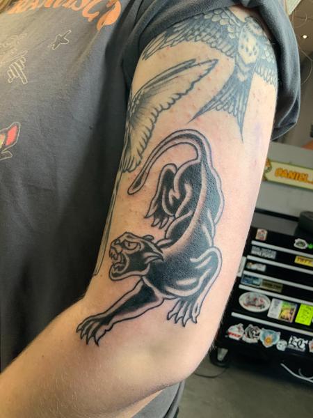 Traditional crawling panther tattoo by @eagles_of_swindon