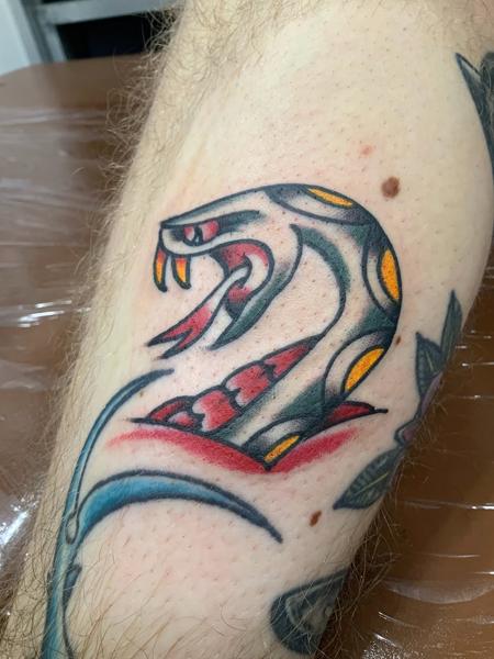 Traditional traditional snake tattoo by @eagles_of_swindon