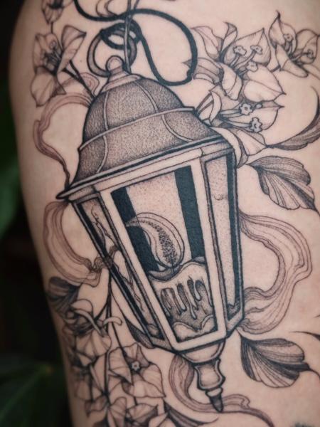 Dotwork floral lantern tattoo by @ariannamcgradytattoo