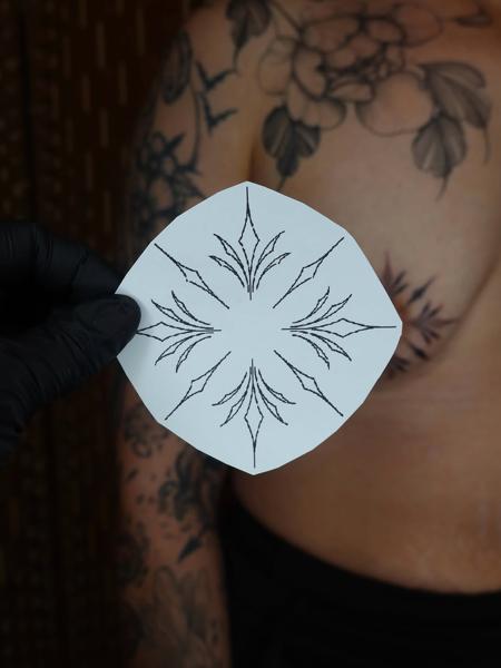 Ornamental ornamental star tattoo by @ariannamcgradytattoo