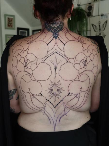 Ornamental blackwork ornamental backpiece tattoo by @ariannamcgradytattoo