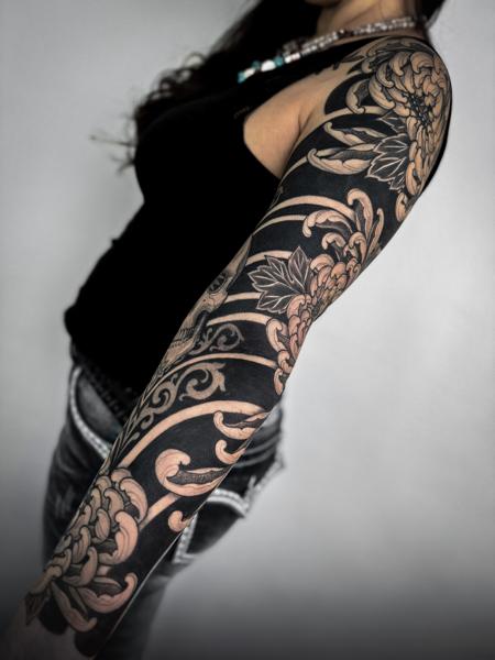 Japanese floral sleeve tattoo by @ariesrhysing