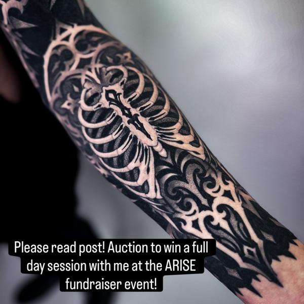 Blackwork ribcage design tattoo by @ariesrhysing