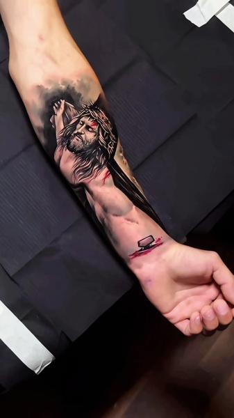 Realism crucifixion scene tattoo by @artgambler