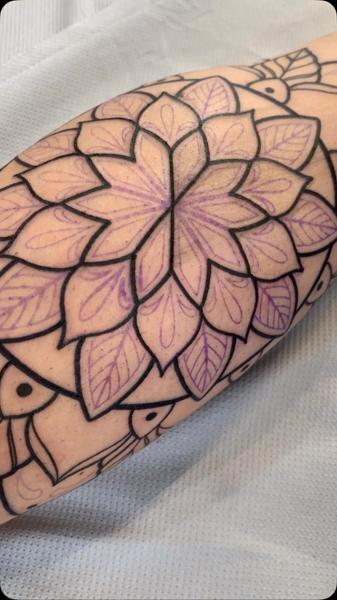 Linework mandala flower tattoo by @astonreynolds