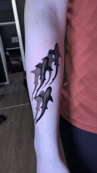 Realism sharks tattoo by @design4lifetattoo