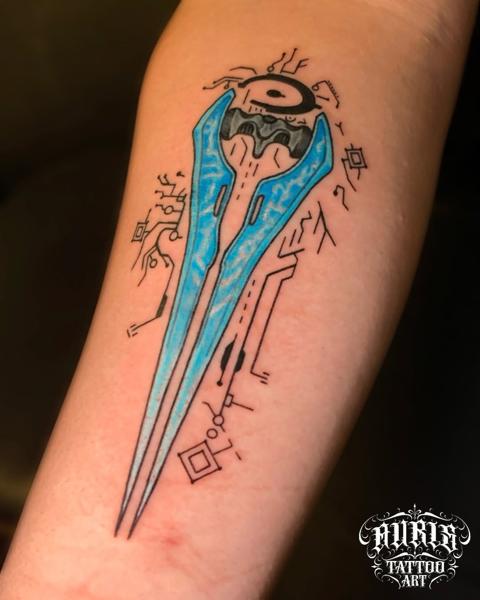 Illustrative futuristic dagger tattoo by @design4lifetattoo