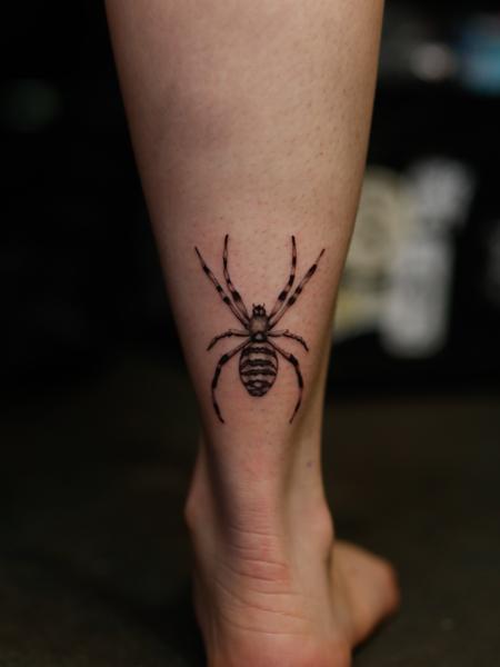 Realism spider tattoo by @azramatitattoo