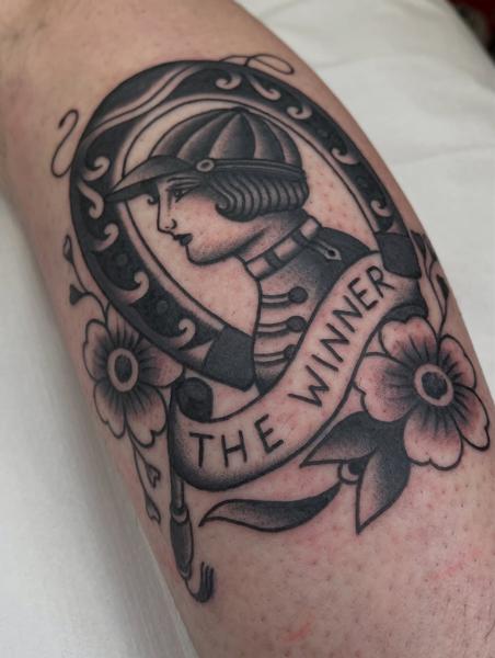 Traditional jockey portrait tattoo by @batter_tattooer
