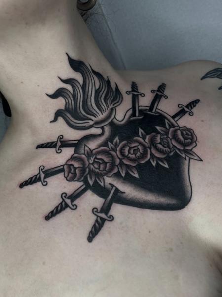 Blackwork sacred heart swords tattoo by @batter_tattooer