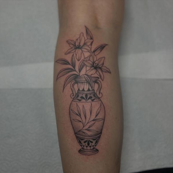 Fine line floral vase tattoo by @bec_tattoo