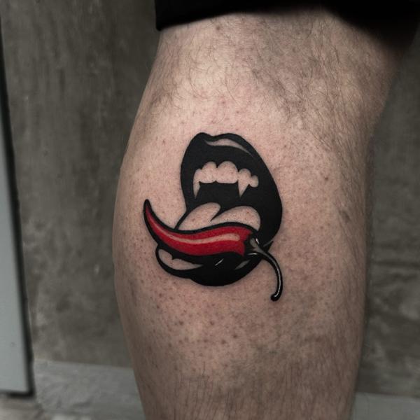 Traditional vampire mouth tattoo by @beirxtt