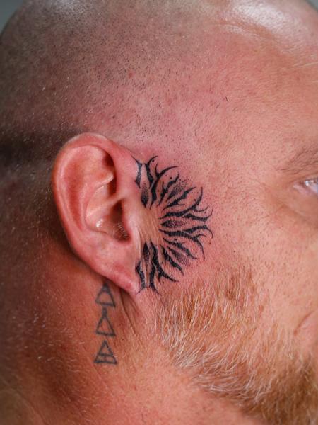 Tribal tribal sun tattoo by @ben_h_tattoo