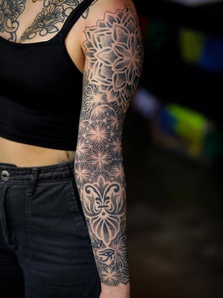 Geometric geometric floral tattoo by @ben_h_tattoo