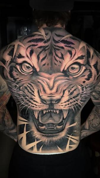 Realism tiger face tattoo by @benjaminlaukis