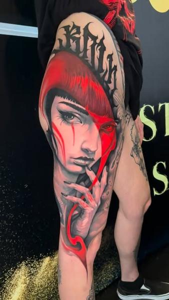 Realism red hooded woman tattoo by @benjaminlaukis
