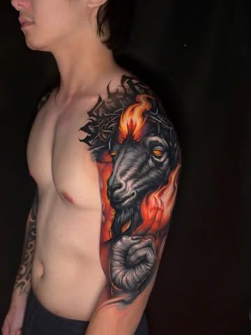 Realism flaming goat tattoo by @benjaminlaukis