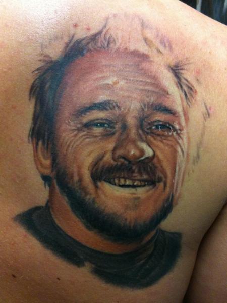 Realism portrait tattoo by @benjaminmosstattoo
