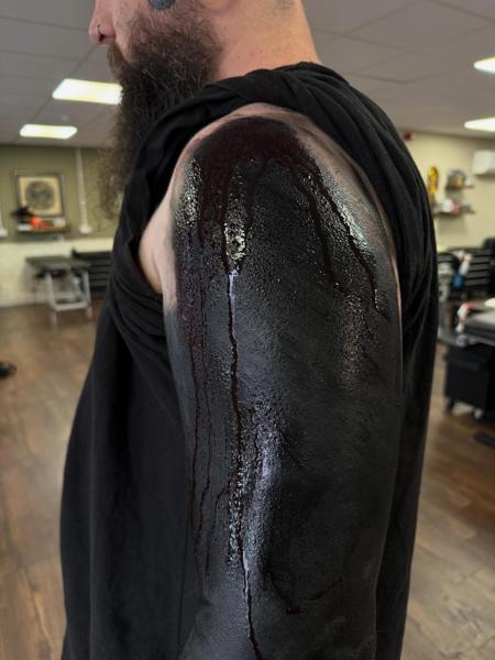 Blackwork solid black arm tattoo by @bintt