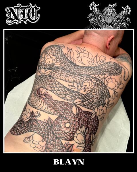 Japanese snake and flowers tattoo by @_blayn_