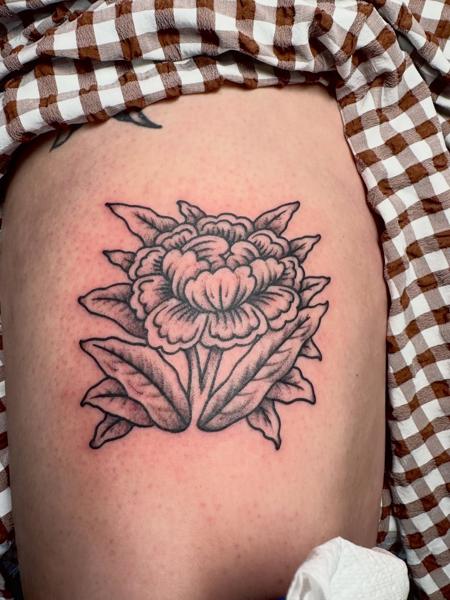 Traditional floral design tattoo by @_blayn_
