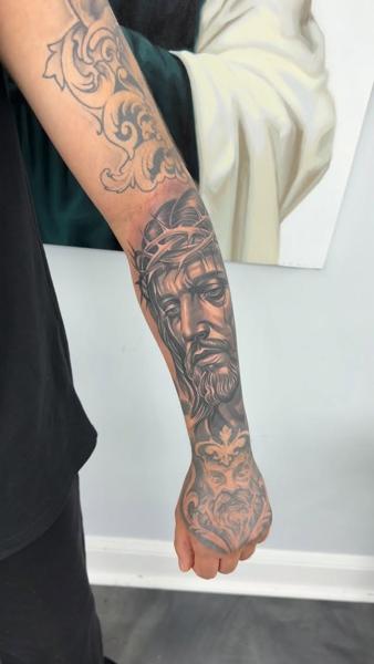 Realism jesus portrait tattoo by @bluedevilsink