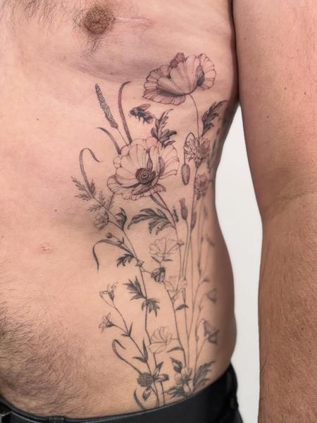 Fine line floral arrangement tattoo by @brittbeale