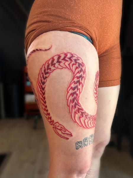Linework snake skeleton tattoo by @brooke_michael_englehart