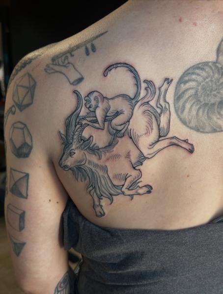 Linework monkey on goat tattoo by @brooke_michael_englehart