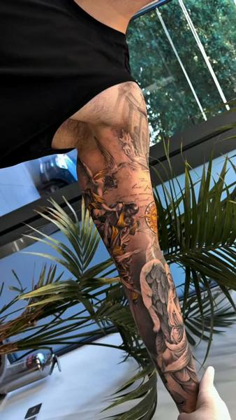 Realism angelic sleeve tattoo by @cagriesk