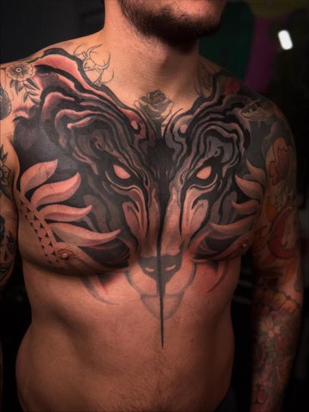 Blackwork glowing animal face tattoo by @mr.calle