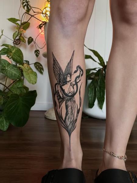 Linework angel with snake tattoo by @dijon.did.it
