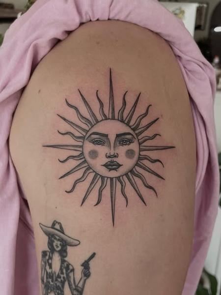 Fine line sun face tattoo by @dijon.did.it