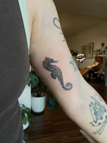 Fine line seahorse tattoo by @dijon.did.it