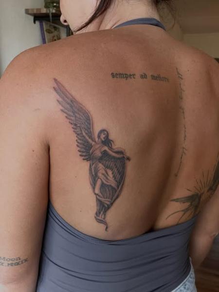 Realism angel figure tattoo by @dijon.did.it