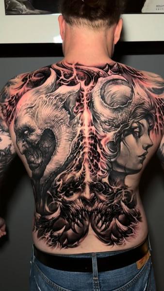 Realism demonic figures tattoo by @carlgracetattoos