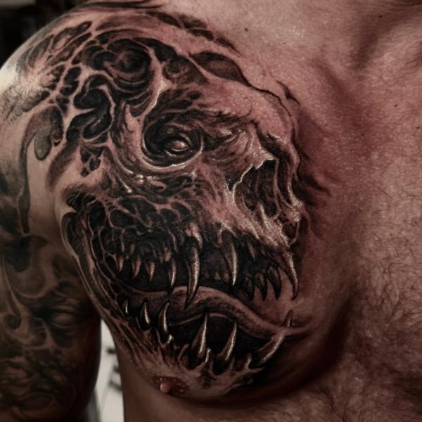 Realism dinosaur skull tattoo by @carlgracetattoos