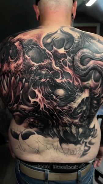 Realism demonic skull tattoo by @carlgracetattoos