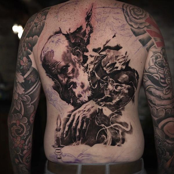 Realism dramatic portrait tattoo by @carlostorresart